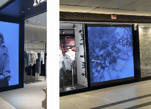 Écran les gérant dans un hall d'un centre commercial